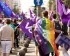 Volters marching in Bucharest with rainbow flag