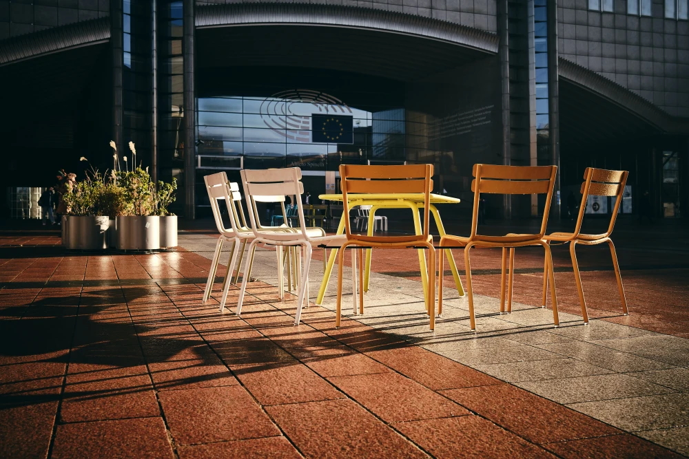 Photo of some chairs and a table at the European Parliament in Brussels